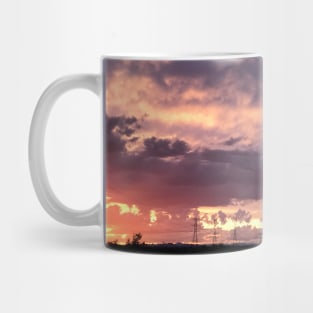 Brilliantly lit clouds at sunset Mug